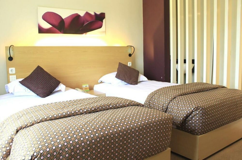 Фото Tychi Hotel