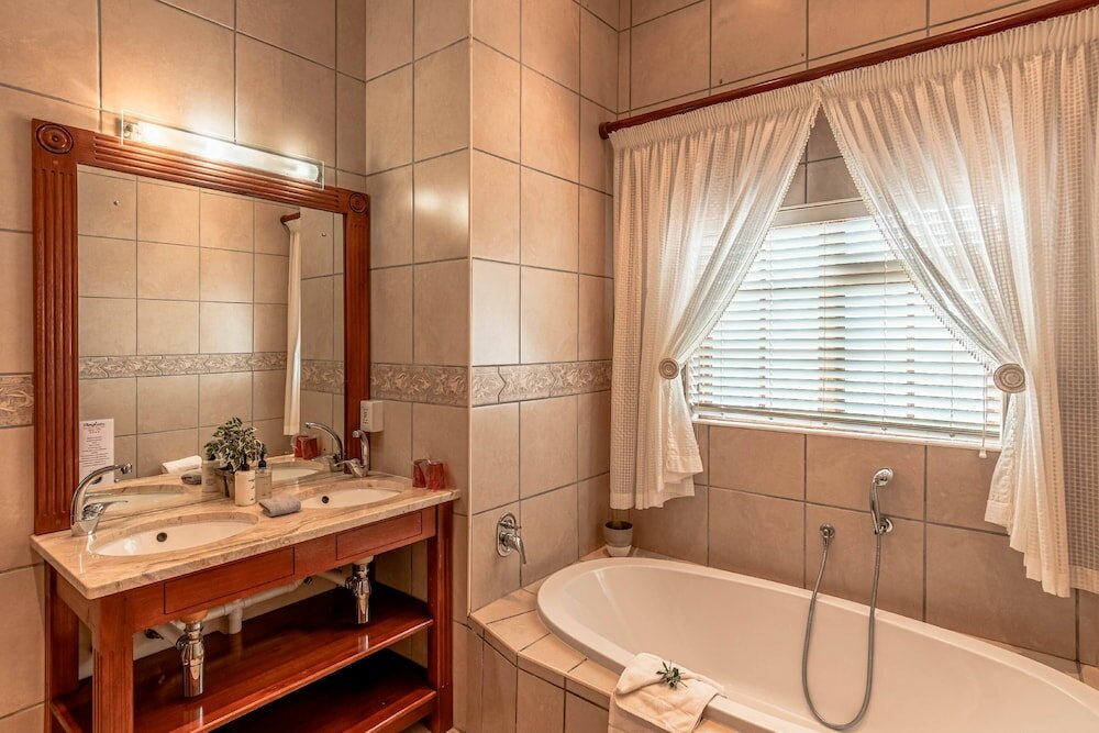 Фото Mooiplaas Guesthouse