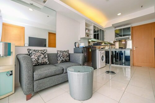 Гостиница Warm and Modern Cozy 2br @ Cinere Bellevue Apartment в Депоке