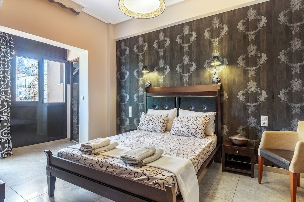 Фото Toti Boutique Rooms