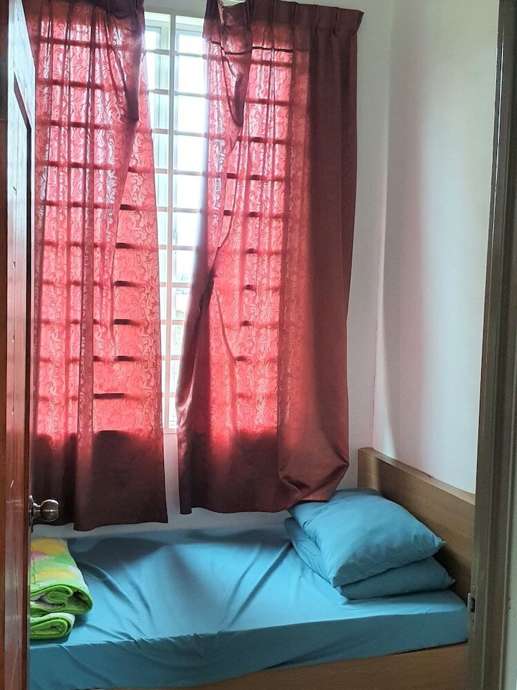 Фото Oyo Home 90496 Delima Homestay