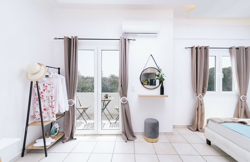 Фото Ermis Luxury Suites & Apartments