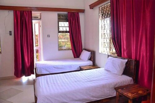 Гостиница A Cosy Apartment in the City of Kampala в Кампале