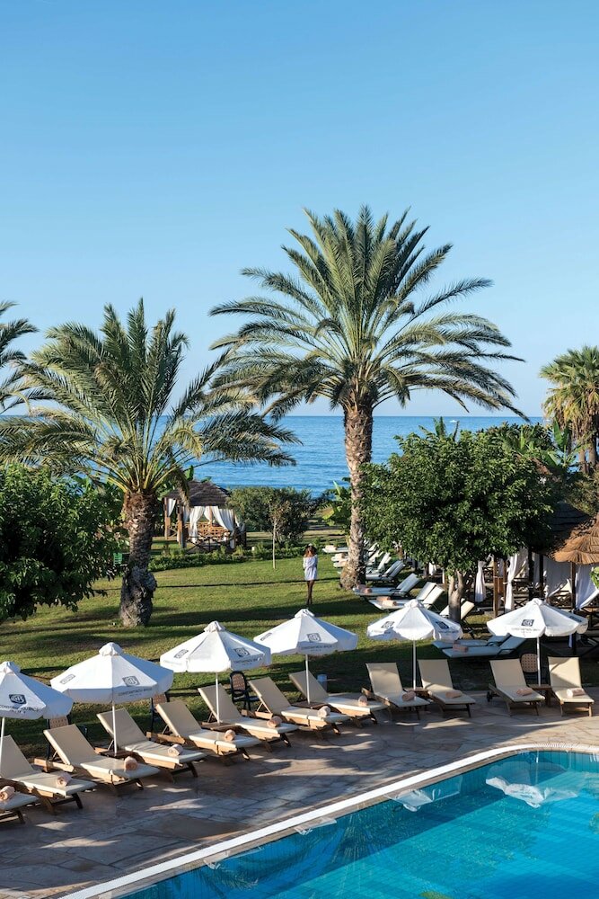 Фото Constantinou Bros Athena Royal Beach Hotel