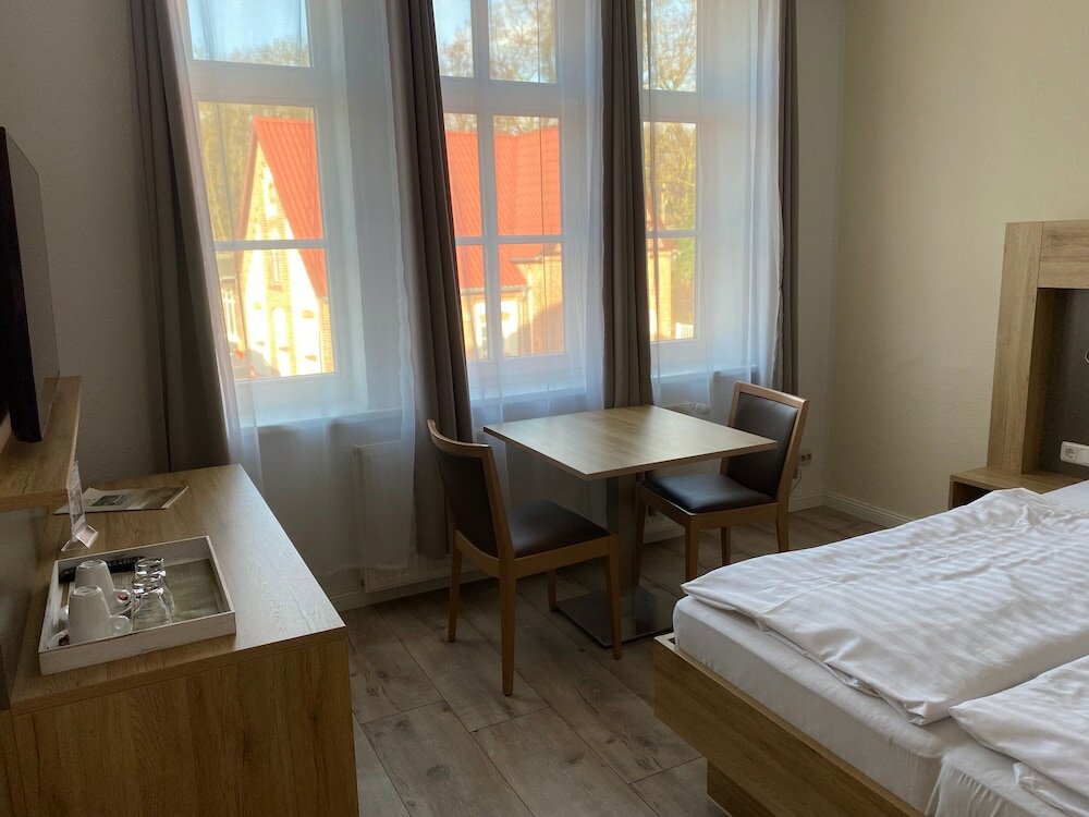 Фото Hotel Pension Zum Alten Fährhaus