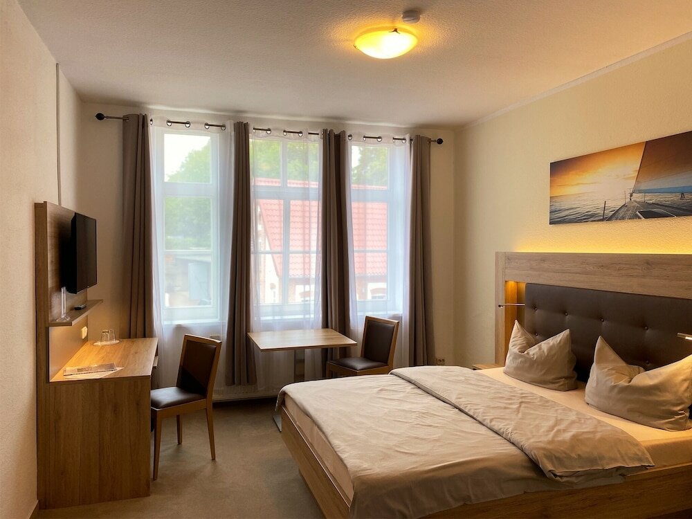 Фото Hotel Pension Zum Alten Fährhaus