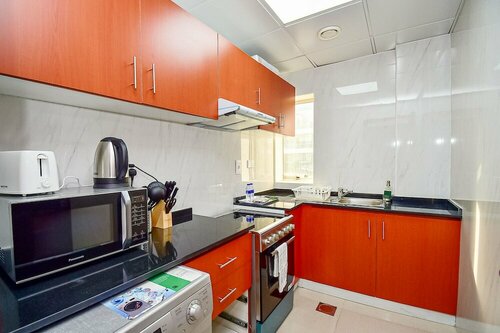 Апартаменты Prl Spacious studio with closed kitchen в Дубае