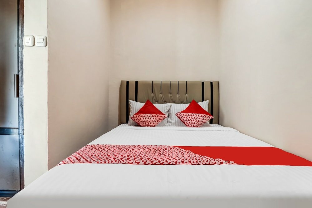 Фото Oyo 91021 Steze Kost & Guest House