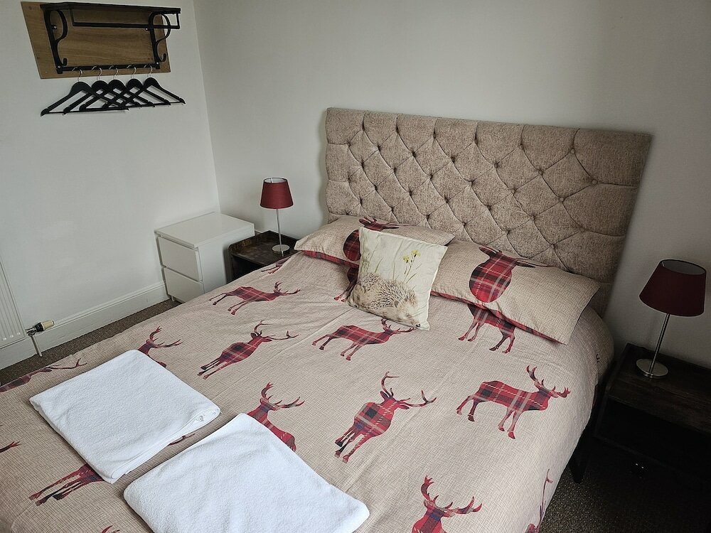 Фото Snug - Abhainn Apartment