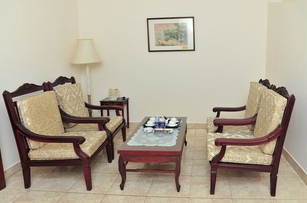 Фото Oyo 103 Airport Family Apartment