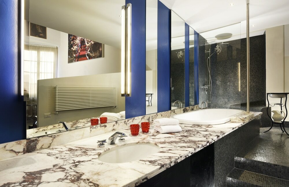 Фото Leone Blu Suites Una Esperienze