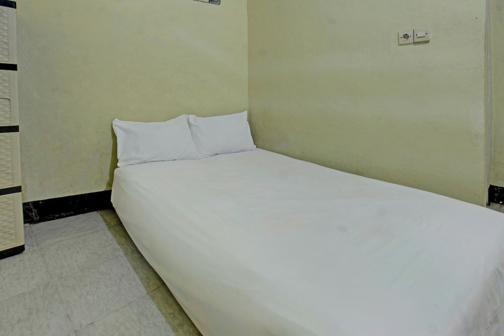 Фото Spot On 92882 Penginapan 3 Bersaudara