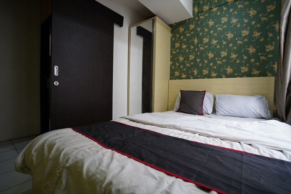 Фото Collection O 92981 Apartemen The Jarrdin