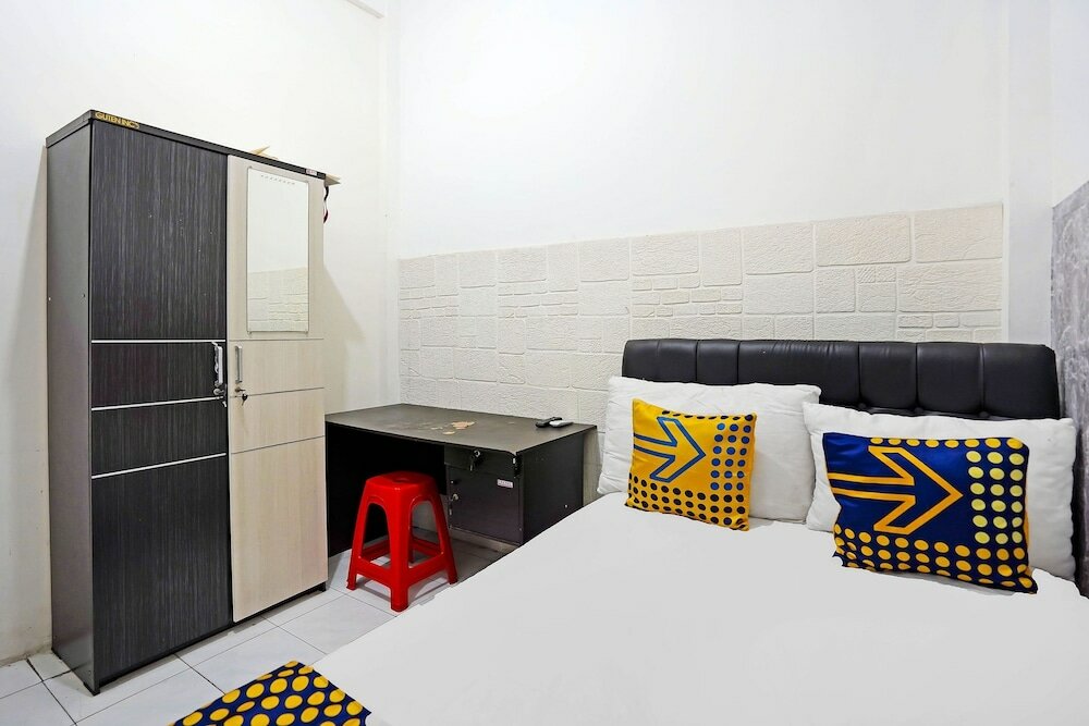 Фото Spot On 91360 Swk 68 Syariah