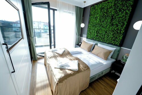 Гостиница Aparthotel Green Concrete в Свиноуйсьце
