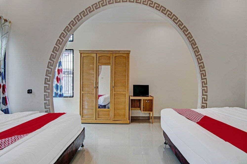 Фото Oyo 92211 Timur Raya Homestay Syariah