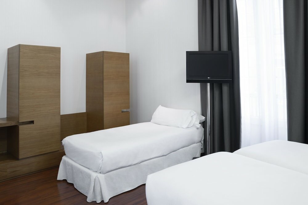 Фото Petit Palace Plaza Malaga Hotel