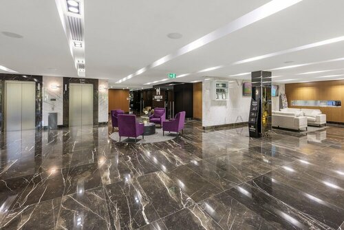 Гостиница Meriton Suites North Ryde в Сиднее