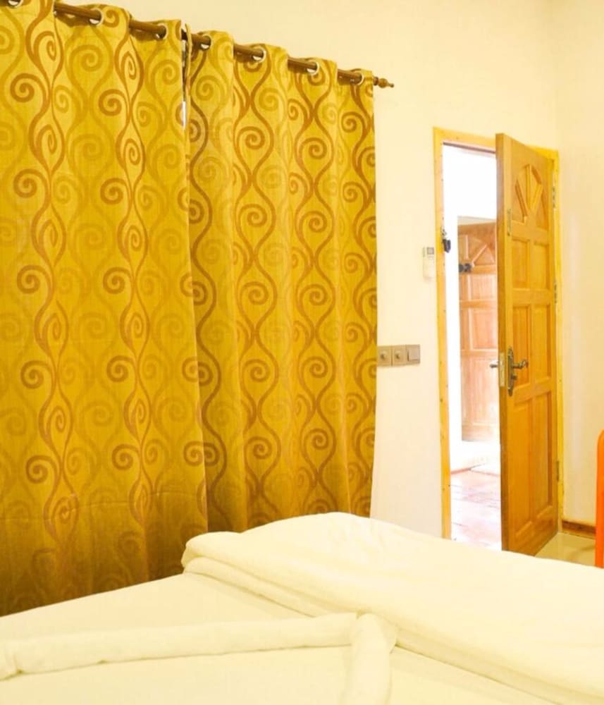 Фото Madagali Inn