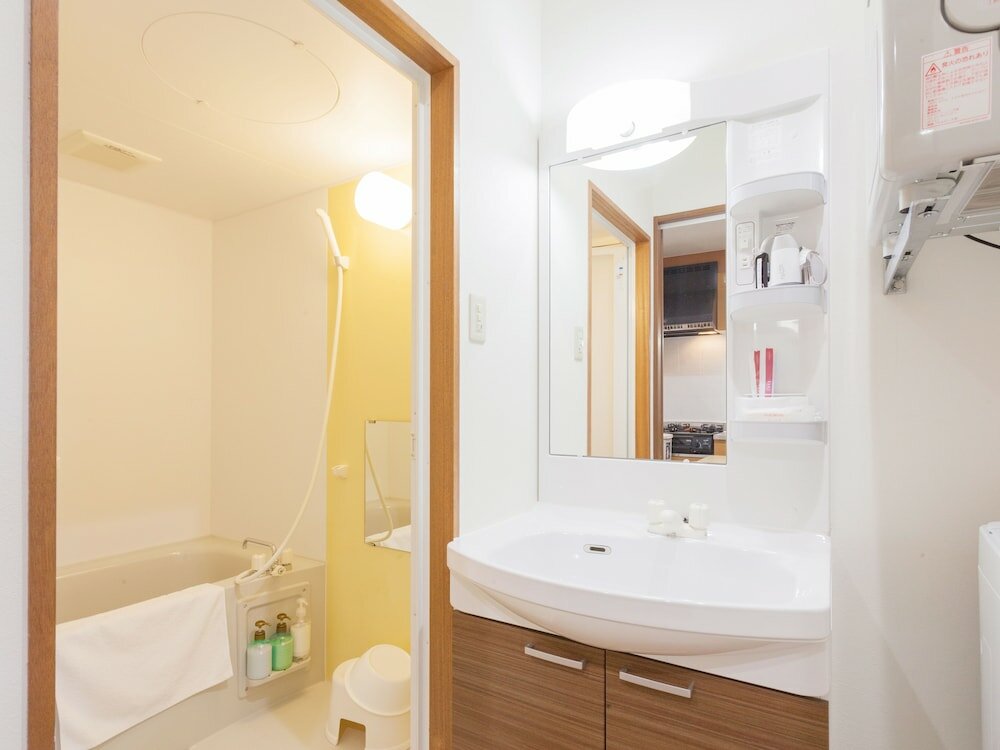 Фото Kariyushi Condominium Resort Kin Yaka Seaside