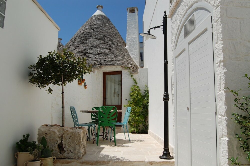 Фото Trulli Holiday Albergo Diffuso