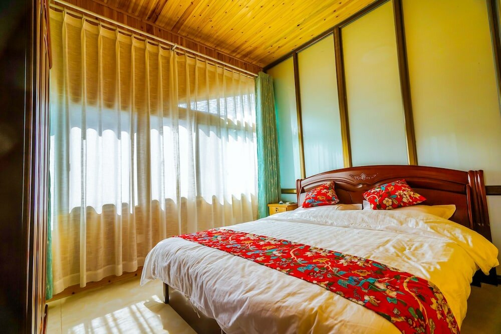 Фото Yijie Holiday Hotel Water GreatWall No. 2