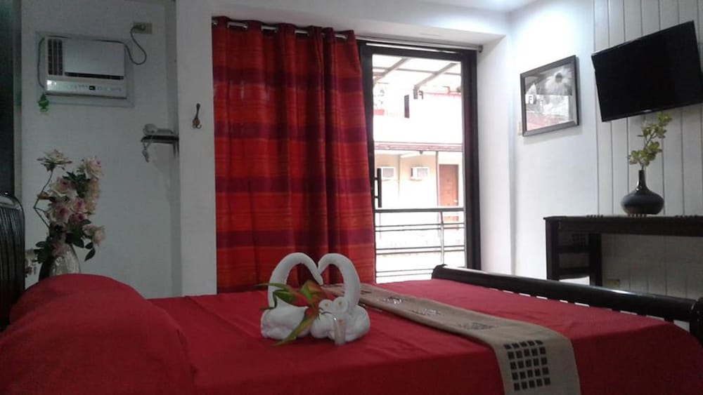 Фото Quezon Premier Hotel Lucena