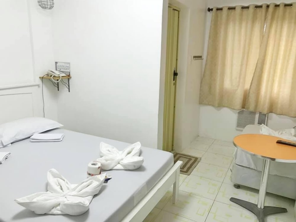 Фото Quezon Premier Hotel Lucena