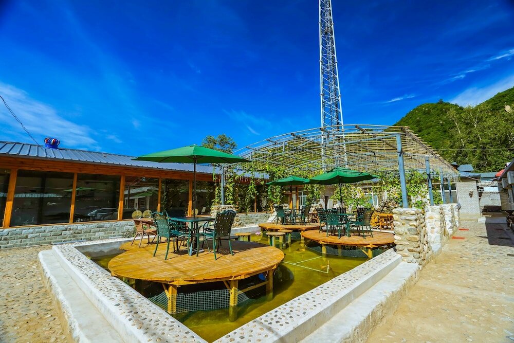 Фото Yijie Holiday Hotel Water GreatWall No. 2