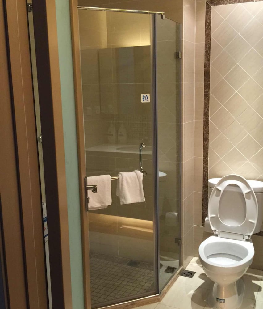 Фото Dalian Aolai Hotel Apartment