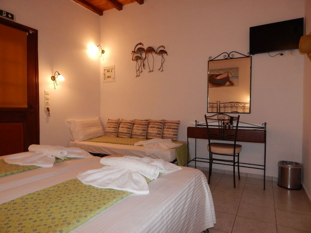 Фото Tinos Suites & Apartments