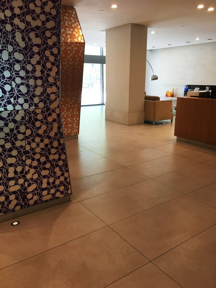 Фото Altitude Suites Bay Street by Teristo Group