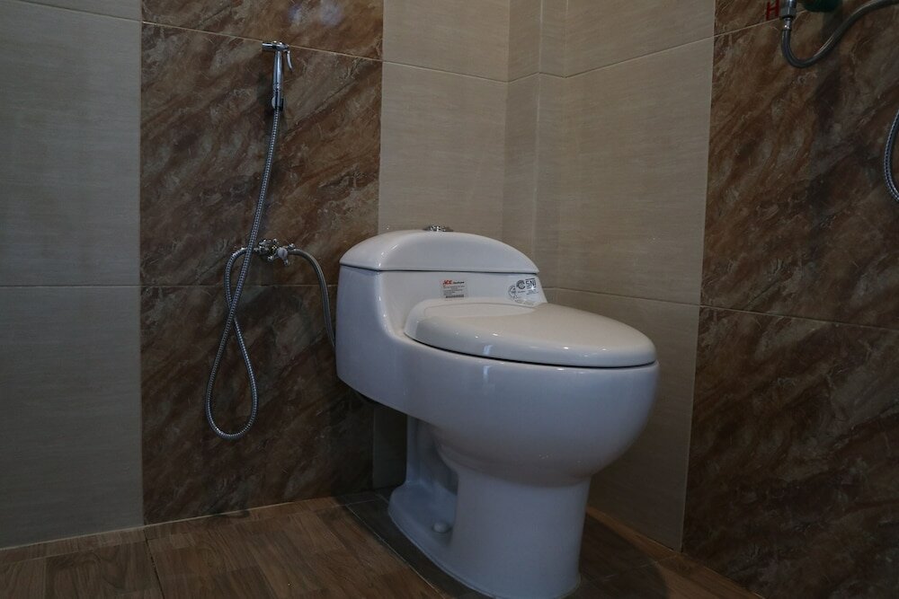 Фото Oyo 1648 Penginapan Three Joye