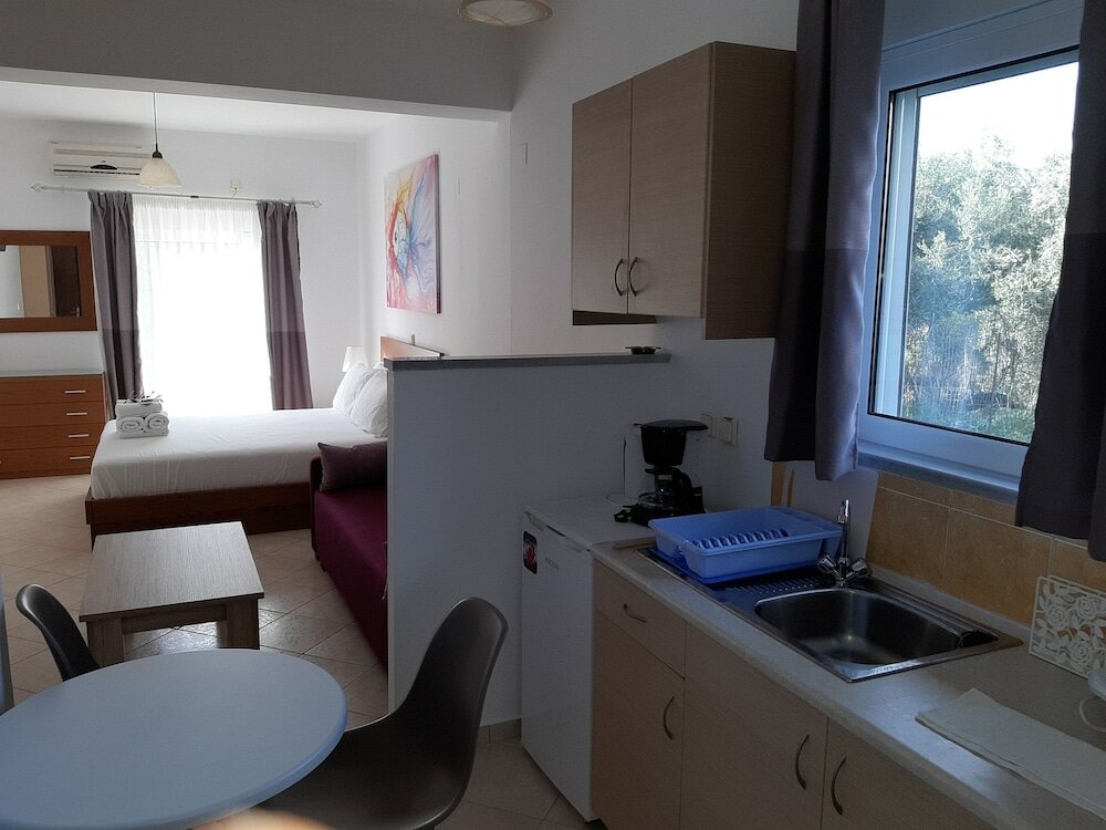 Фото Olive Tree Apartment