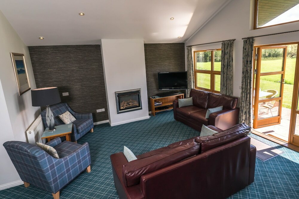 Фото Loch Lomond Waterfront Luxury Lodges