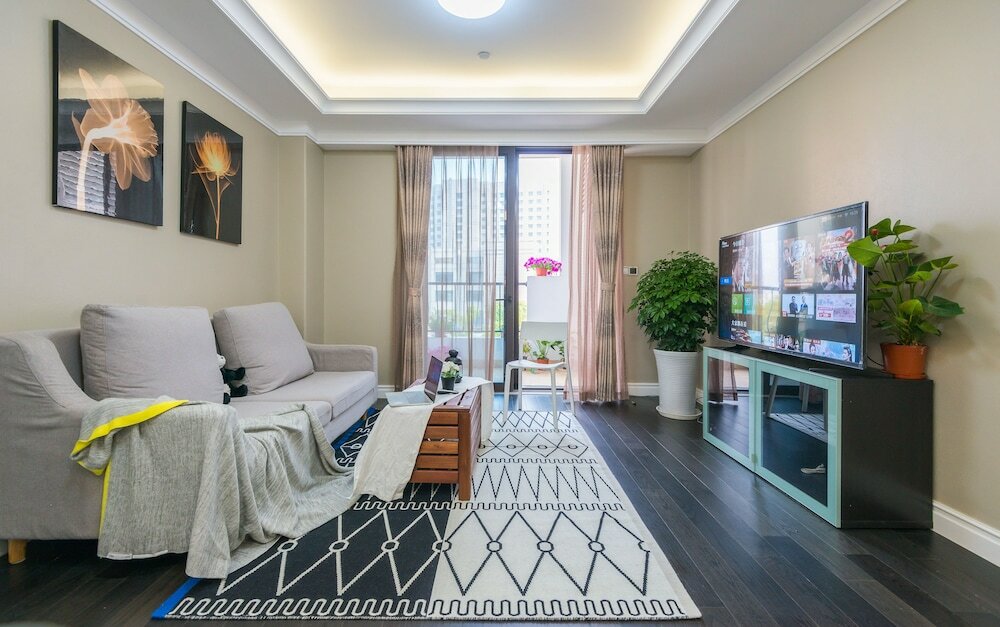 Фото Shanghai Xinchuan Boutique Apartment