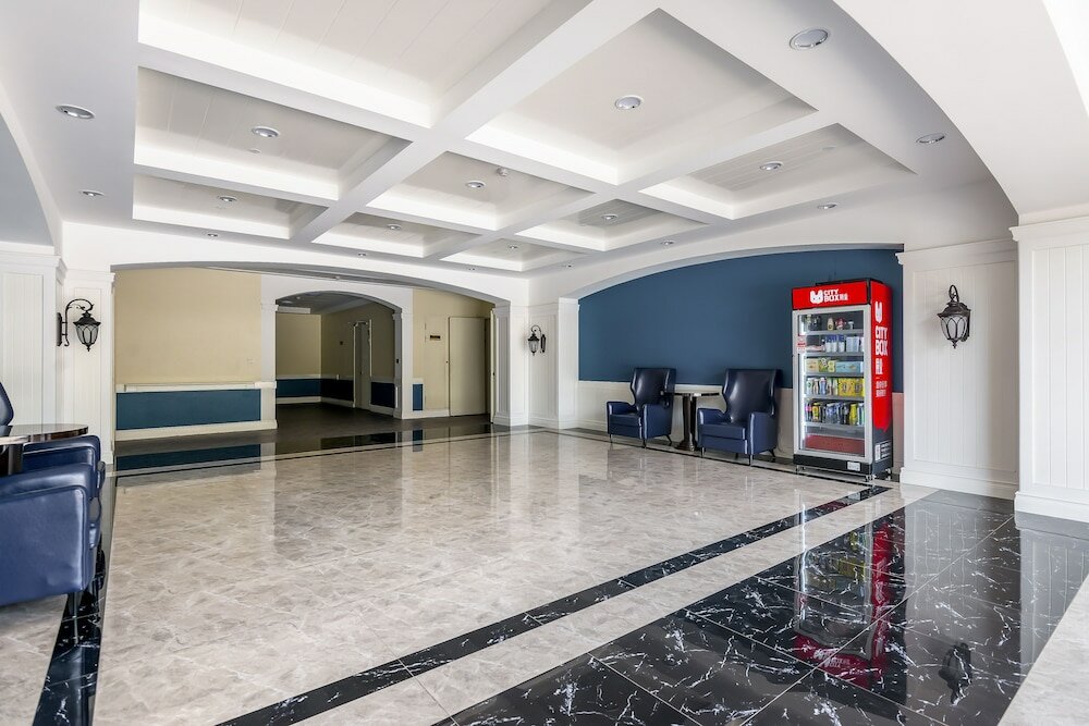 Фото Shanghai Xinchuan Boutique Apartment