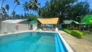 Гостиница Seaside Travelers Inn by Camiguin Island Home