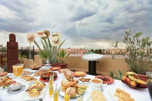 Гостиница Amani Hotel Suites & SPA
