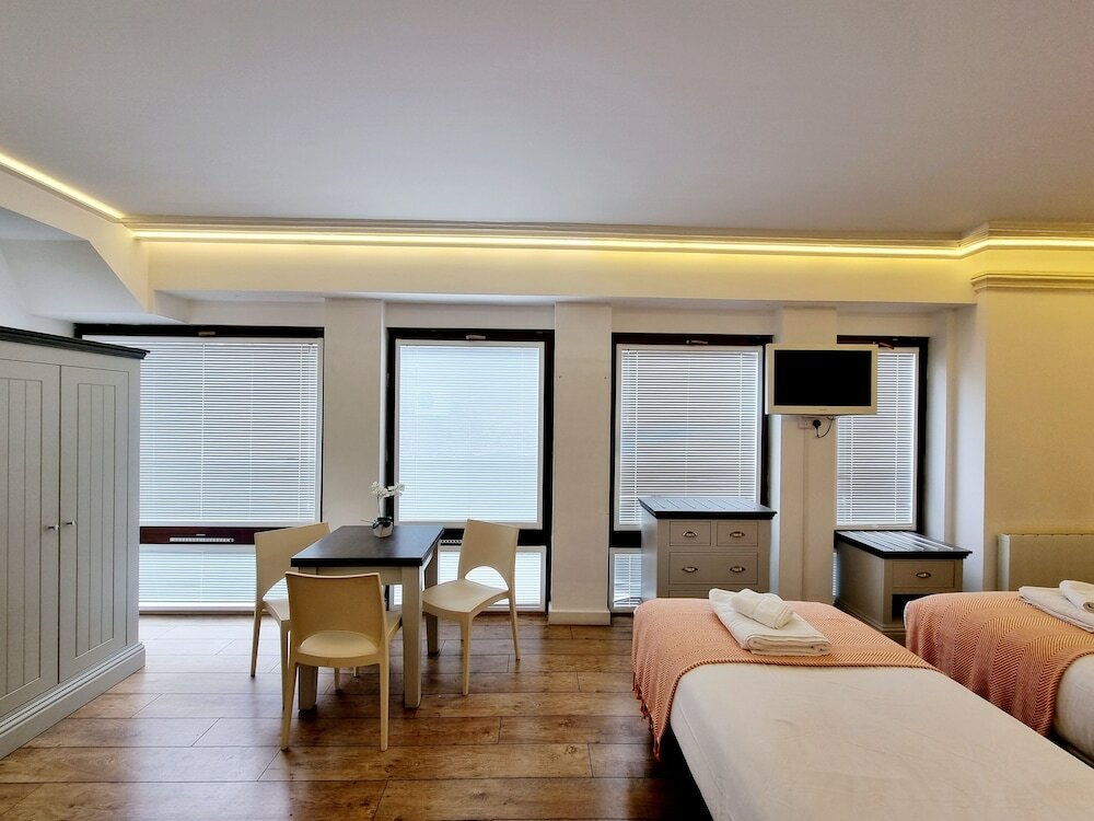 Фото London Stay Apartments