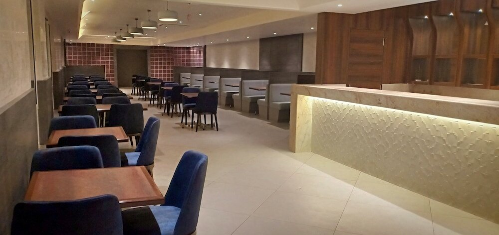 Фото Cosmique Clarks Inn Suites, Goa