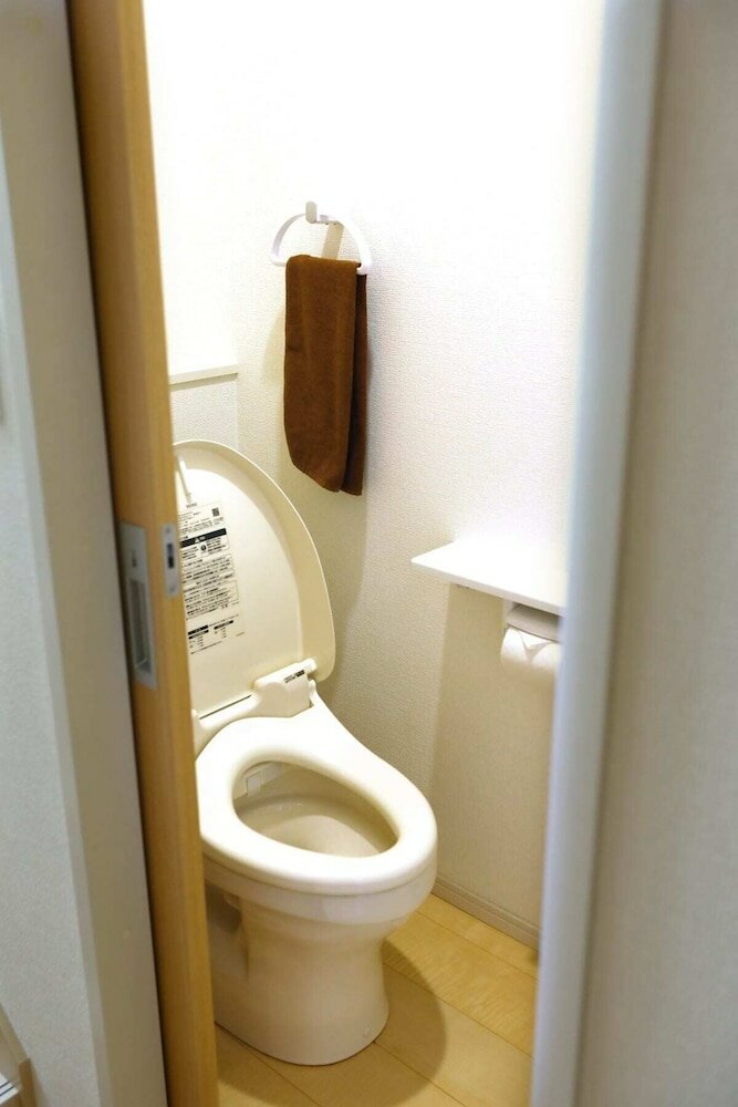 Фото Condomium Motobu Sakura Terrace