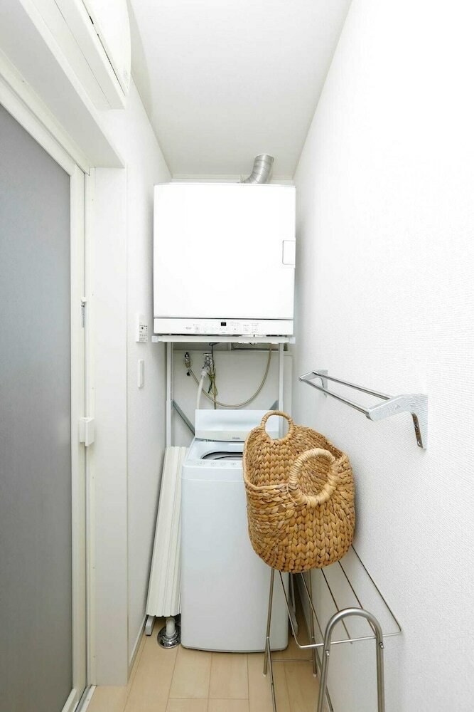 Фото Condomium Motobu Sakura Terrace