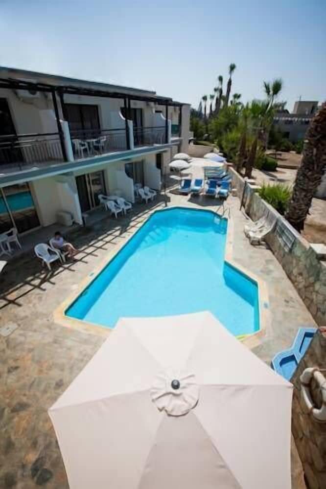 Фото Crystallo Apartments