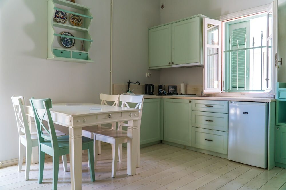 Фото Efchi Suites 1904