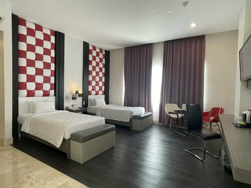 Гостиница Swiss-Belcourt Makassar