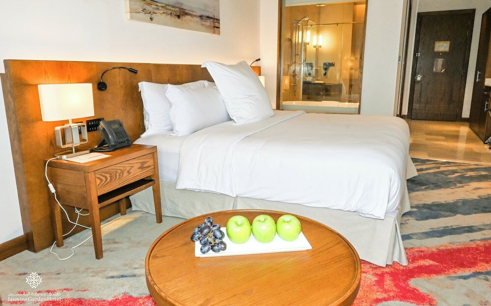 Фото Jasmine Garden Hotel