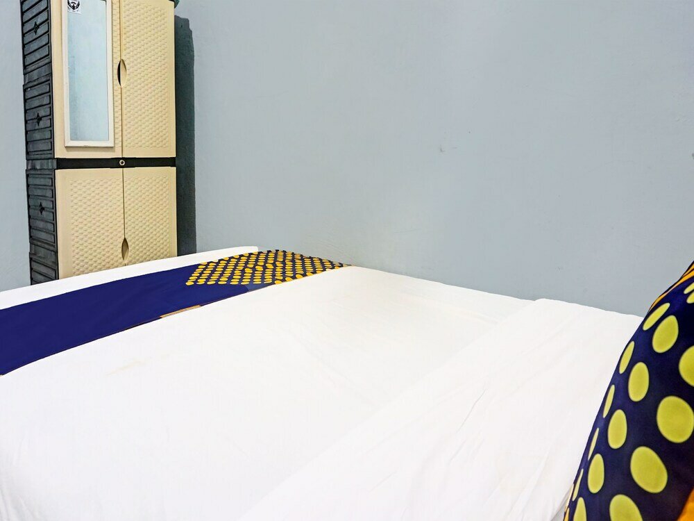 Фото Spot On 91600 Syariah Army Kost & Home