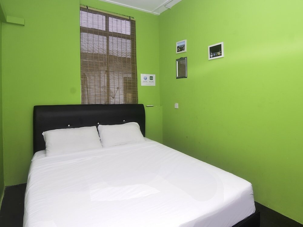 Фото Spot On 89929 Tropical Lodge