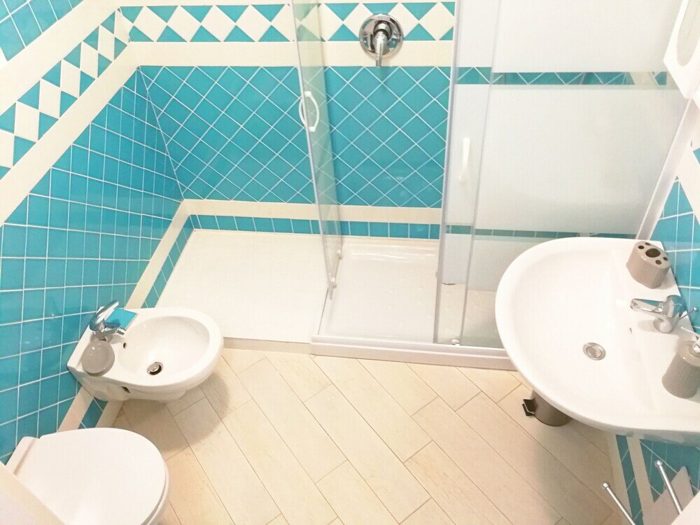 Фото Affittimoderni Isola Rossa Élite - Pati15